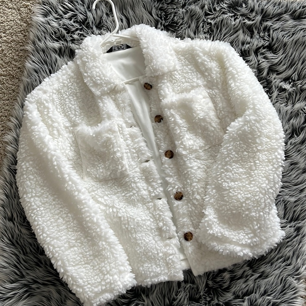 White fleece like coat